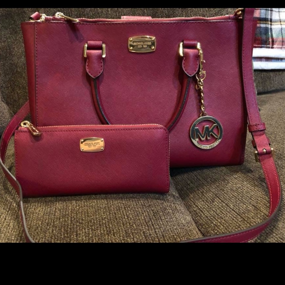 Burgundy Michael Kors purse with matching wallet
